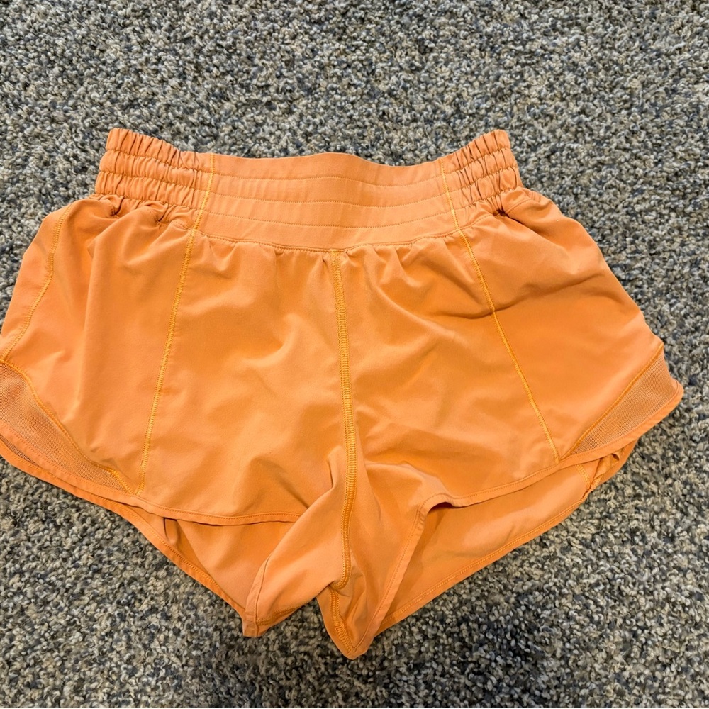 lululemon athletica Orange Athletic Shorts Lightweight worn around 5 times 2.5